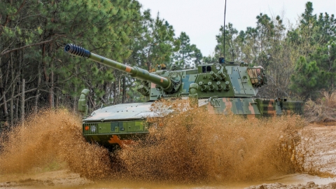 Wheeled armored assault vehicles in live-fire training