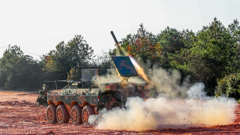 Vehicle fires wire-guided minesweeping explosive device