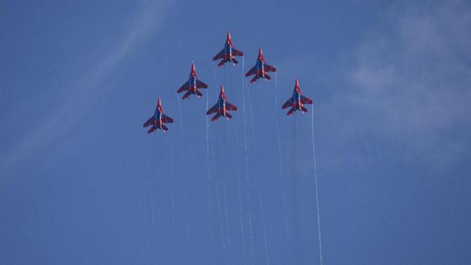 Russian aerobatic team Strizhi flies during the Army-2015 show at a shooting range in Alabino, outside of Moscow, Russia, on Tuesday, June 16, 2015. Russia’s military this year alone will receive over 40 new intercontinental ballistic missiles capable of piercing any missile defences, President Vladimir Putin said Tuesday in a blunt reminder of the nation’s nuclear might amid tensions with the West over Ukraine. (AP Photo/Ivan Sekretarev)