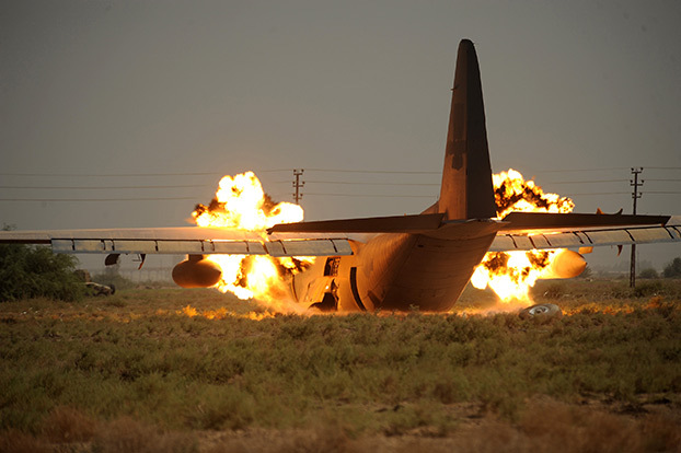 A C-130 is blown up into smaller pieces by Explosive ...