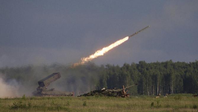 Russian TOS-1A Solntsepyok (Sunheat) heavy flame throwing launcher fires during the Army-2015 show at a shooting range in Alabino, outside of Moscow, Russia, on Tuesday, June 16, 2015. Russia’s military this year alone will receive over 40 new intercontinental ballistic missiles capable of piercing any missile defences, President Vladimir Putin said Tuesday in a blunt reminder of the nation’s nuclear might amid tensions with the West over Ukraine. (AP Photo/Ivan Sekretarev)