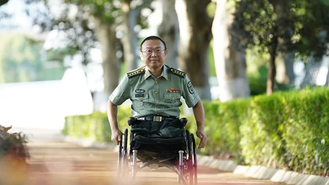 轮椅上“跑出”的加速度——记国防科技大学计算机学院研究员王戟