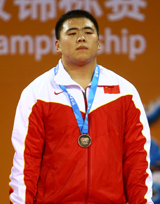 邓志伟,摔跤运动员.